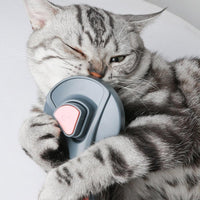 PurrfectClean™ Brush: Effortless pet grooming with self-cleaning feature, gentle bristles, and ergonomic design. 