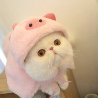 Playful and Practical: PurrfectPink™ Pet Cloak for Cats.