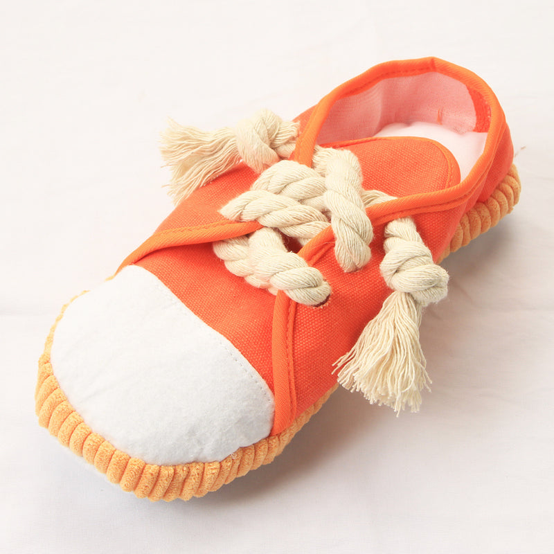 Adorable squeaky sneakers for pets - the perfect toy to engage and delight your furry friend!